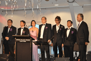 ACMA Gala Dinner Singing the National Anthem: ACMA President Dr Danforn Lim, with Hon Victor Dominello MP (NSW Minister of Citizenship & Communities), Dr Cindy Pan (MC & Ambassador for Northcott Disability Services), Dr Seng Chua, Dr Stephen Hing , Dr Jenson Mak (Convenor of 2012 ACMA Gala Dinner & Chair of Social Commitee), & Mr John Alexander MP (Federal Member for Bennelong)